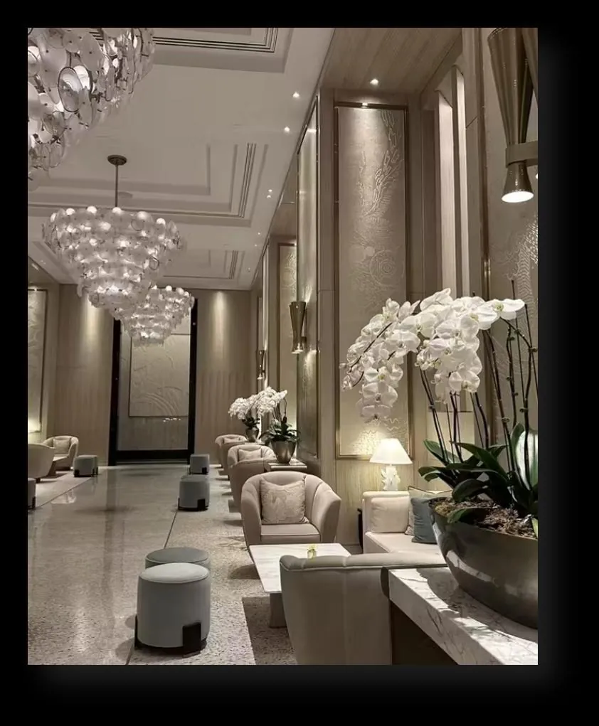 Waldorf Astoria Doha West Bay — lobby lounge with crystal chandeliers and orchid arrangements